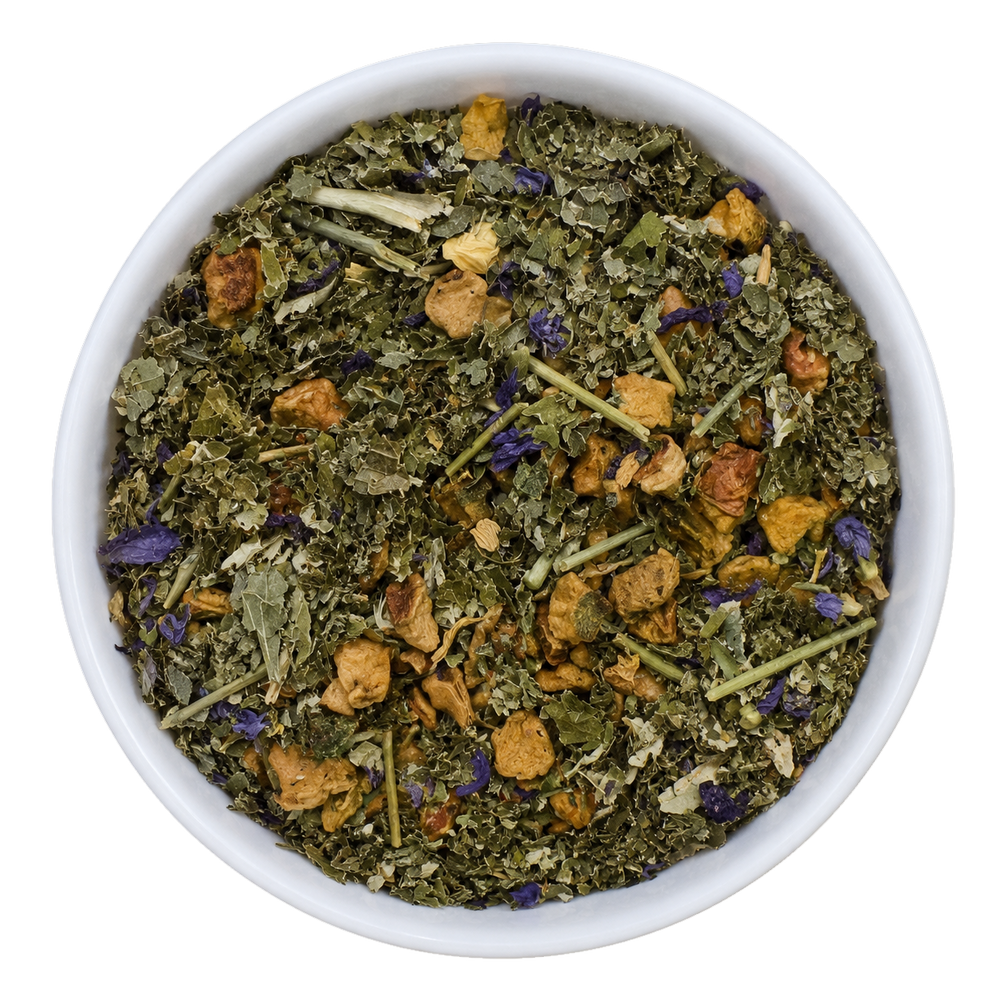 Herbal tea mix in a white bowl on a white background