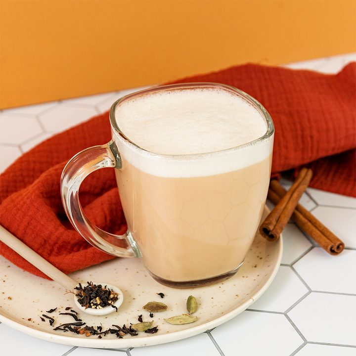 Creamy Organic Pumpkin Chai latte with cinnamon and pumpkin seeds