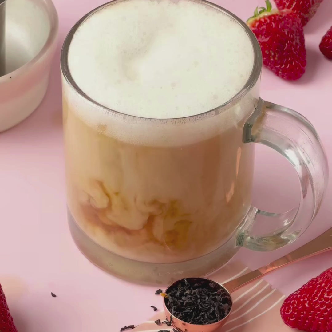 A video of someone preparing Strawberry Earl Grey Cream Latte