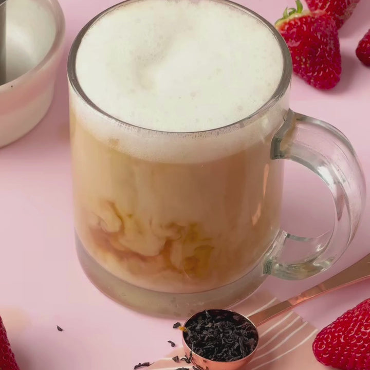 A video of someone preparing Strawberry Earl Grey Cream Latte