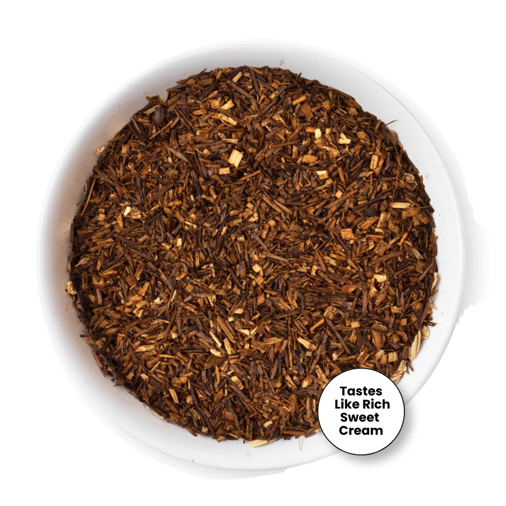 A top-down view of loose-leaf tea in a white bowl, with a small circular badge in the lower right that reads 'Tastes Like Rich Sweet Cream'.