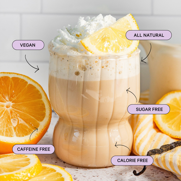 Vegan, all natural, sugar-free, caffeine-free, and calorie-free drink with lemon slices and whipped cream.