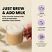 Promotional graphic for a tea-and-milk beverage. A hand holds a frothy beige drink in a clear glass mug on the left, with large text reading 'JUST BREW & ADD MILK.